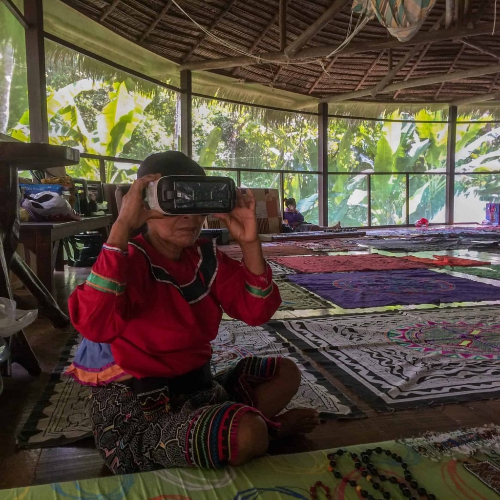 Shipibo elder reviewing a 360 Video experience in the Amazon